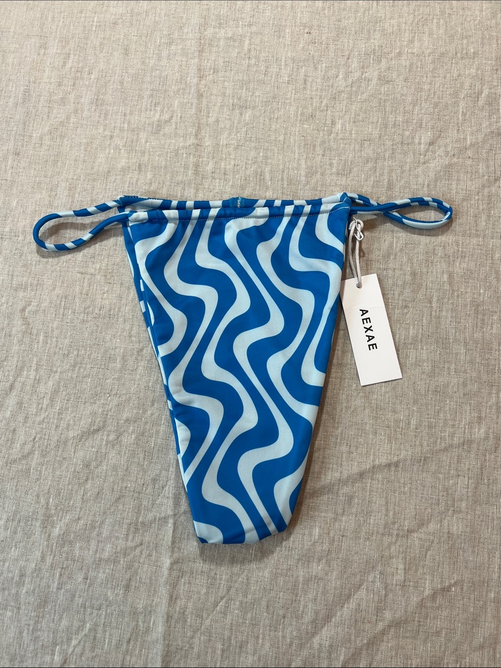 Aexae Blue and White Copacabana Wave String Bikini Bottom. Size L. NWT